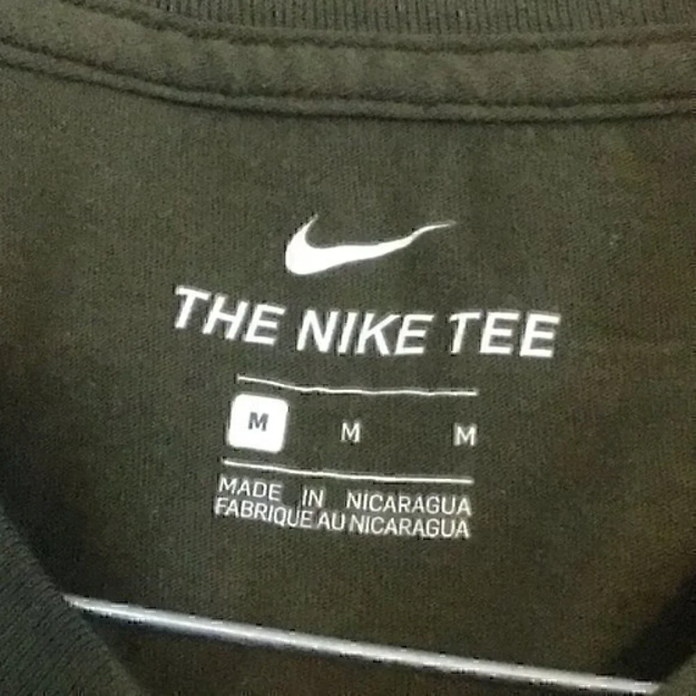 Nike Women’s size medium olive green Nike T-shirt